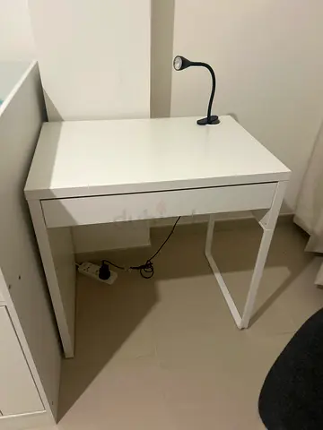 Compact white study desk with drawer and lamp