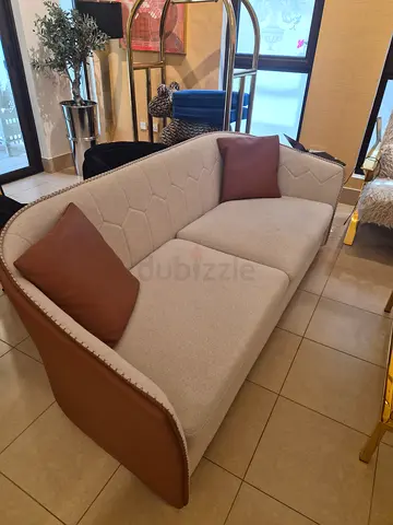 3-Seater Beige Sofa set with Brown Trim, includes single chair, footstall, 2 side tables and cabinet