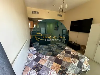 Fully furnished studio for annual rent in a prime location at Al Nuaimiya Towers, featuring a private parking space and a balcony.