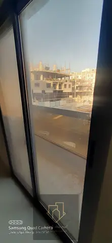 Two rooms and a living room in Al Jurf Industrial Area 3, spacious and distinctive.