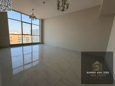 Luxury two-bedroom apartment with a living room for annual rent in Ajman - First occupancy - Storag