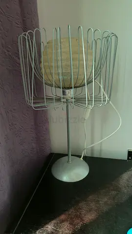 Modern wire-frame table lamp with paper lantern shade. Each 25