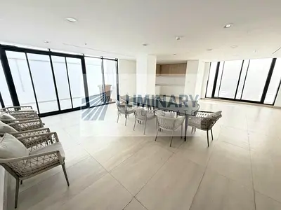 2BR Apartment with Balcony Spacious Layout & Coverd parking