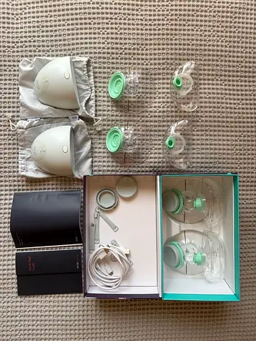 Elvie double breast pump and medela manual pump