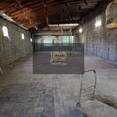 A warehouse in a quiet and strategic location, suitable for storage.