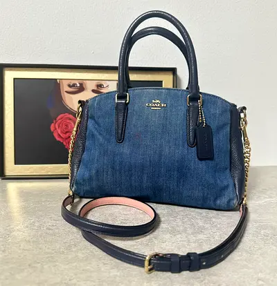 Preloved Coach Mini Sage Carryall handbag in denim and leather.