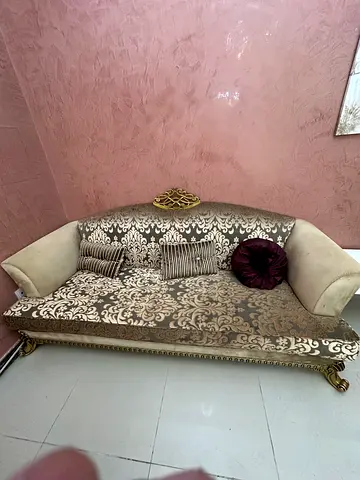 Ornate upholstered sofa with patterned fabric and carved wooden legs , 3 + 3 + 2 royal sofa