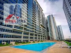 High-Floor Studio | City &amp; Pool View | Skycourts Tower C