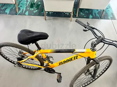 Hardly Used, like new yellow mountain bike - great working condition