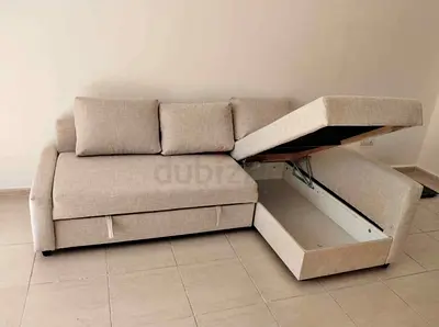 Beige L-shaped Sofa with Storage and Pull-out Bed Good Condition