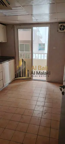 غرفة وصالة واسعة للإيجار في التعاون، مع بلكونة
