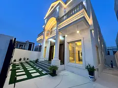 Luxury corner villa with a very large yard, close to all services, near Sheikh Mohammed Bin Zayed Ro