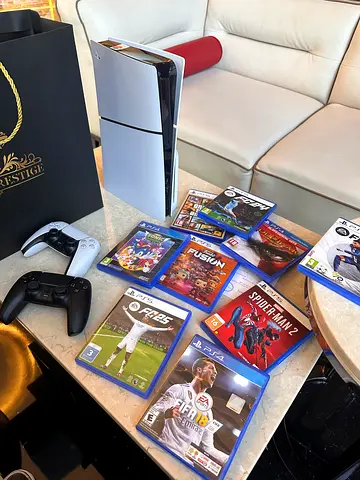 Ps5 slim disc with two controllers and games