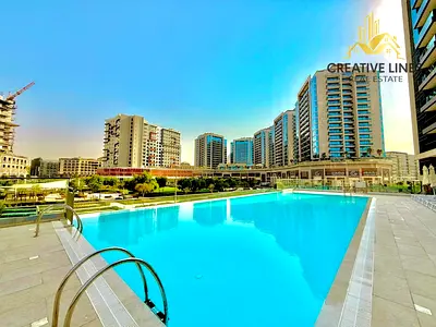 Chiller free | 2BHK apartment with maid’s room and stunning open, pool, and park views.