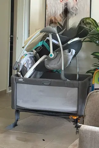 Joie bassinet and swinging chair for baby. Used only for 6 months. Like new