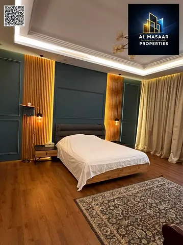 Modern villa, 5000 sq ft, price includes electricity, water, air conditioning, and furniture. The villa is one year old and offered at a special price