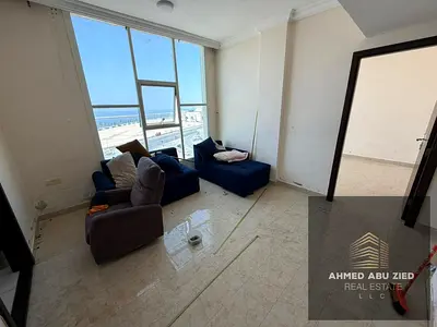 One-bedroom apartment with a direct sea view, located on Ajman Walk, available for annual rent. Enjoy a sophisticated living environment and stunning