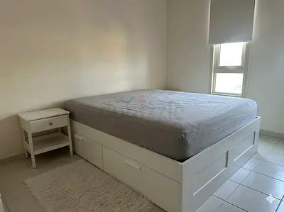IKEA bed with drawers and sides tables