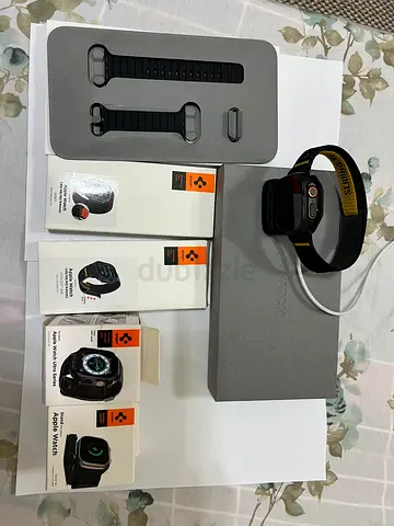 Apple Watch collection with straps, chargers and original boxes - used