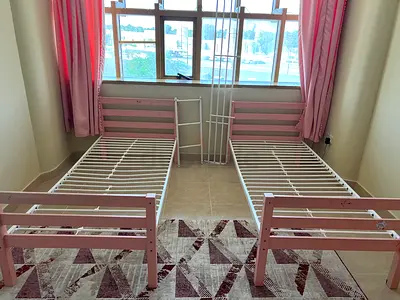 Pair of Pink Single Metal Bed Frames — Good Condition