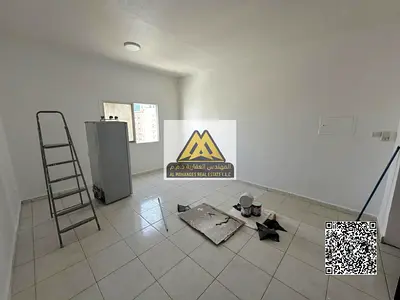 Studio for annual rent in Al Rashidiya 3 – Ajman, prime location opposite Ajman One Towers on a main road.