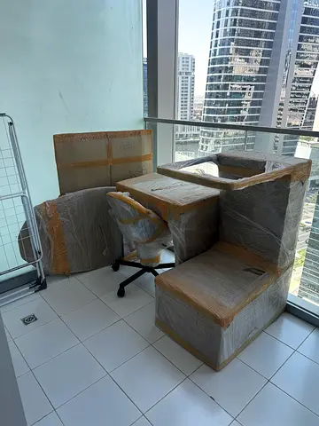 Two desks, one Office chair and one small tablle wrapped for moving - set of 3 to give