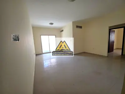 2-bedroom apartment with living room in Al Nuaimiya 2. Balcony, 2 bathrooms, central AC, spacious layout, AED 30,000 in 4 payments, prime location clo