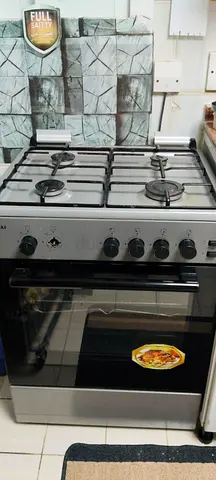 Stainless Steel 4-Burner Gas Cooker with Oven - Good Working Condition