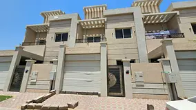 A distinctive townhouse with spacious areas and a practical design, ideal for upscale family living