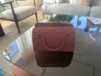 Small mauve handbag with top handles