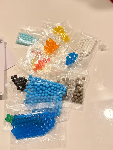Mixed colored water-absorbing beads (small craft beads) - unused packs