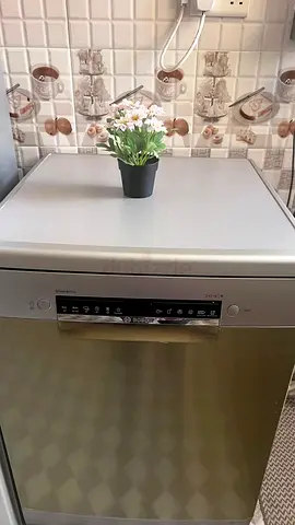 Compact BOSCH stainless steel dishwasher in good condition
