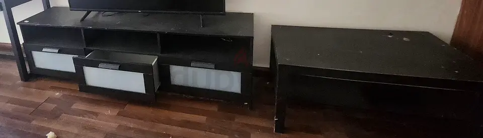 Black TV Entertainment Unit with floating Shelf and black Console with mirrors, grey single chair, t