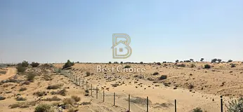 Commercial Plot in Al Ruwaidat – G+2 Permission, Prime Location for Investment and Development