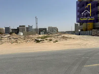 Residential/commercial land for sale in the Al-Fallah camp area, Muwailih commercial district