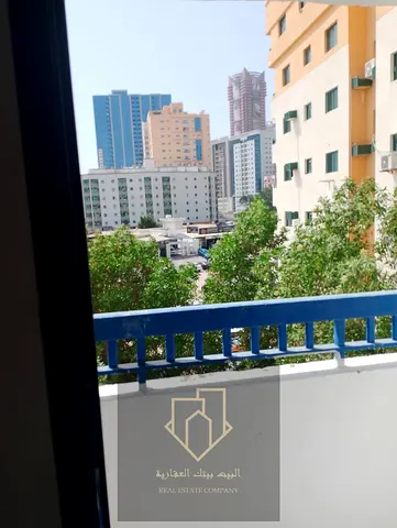 Two-bedroom apartment with a living room in Al Nuaimiya 3, quiet location, for 26,000 AED annually,