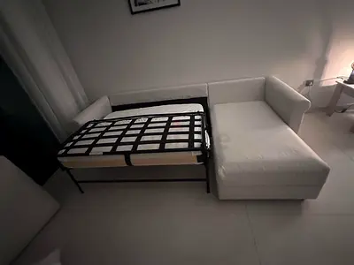 Ikea Gronlid L shape sofa bed BeigeWhite L-shaped sofa bed with pull-out single bed - good condition