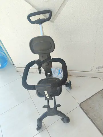 Used toddler ride-on stroller with push handle - good condition