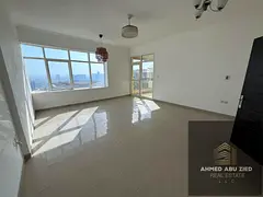 Spacious 1BHK for annual rent in Horizon Towers Rashidiya 1 Ajman open view balcony parking dressing
