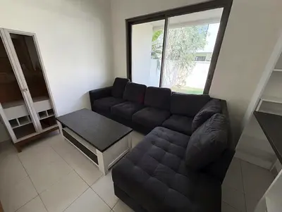 Dark Grey L-Shaped Fabric Sofa with Coffee Table - Good Condition