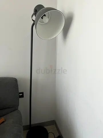 Simple black floor lamp with adjustable head - good condition