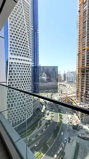 Business Bay Studio | Balcony | Pool &amp; Downtown View