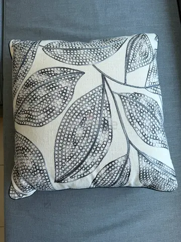 Decorative leaf-pattern throw cushion - neutral grey
