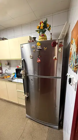 Used stainless steel double-door refrigerator - good working condition