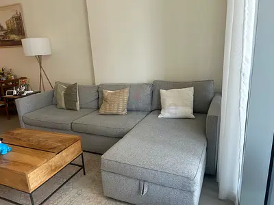 Grey L-shaped Sofa with storage and converted to bed (Good Condition)