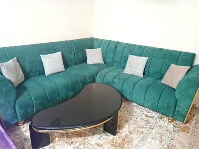 Dark green sofa/couch for sale along with extra pillows