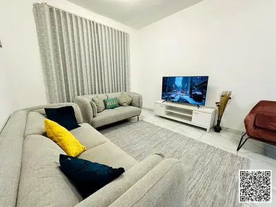 Luxury apartment with a spacious two bedrooms and a living room, fully furnished with a balcony. Ajman, Al Nuaimiya.