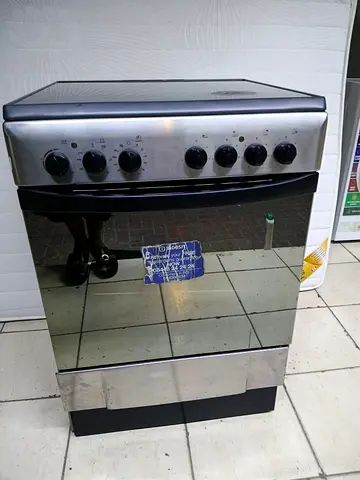 Used freestanding electric oven with 4 burners - stainless steel