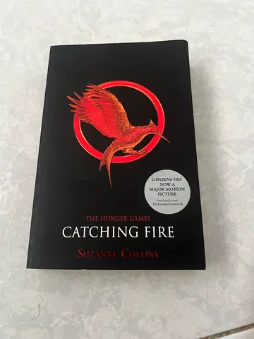 Catching Fire (The Hunger Games #2) by Suzanne Collins - Paperback
