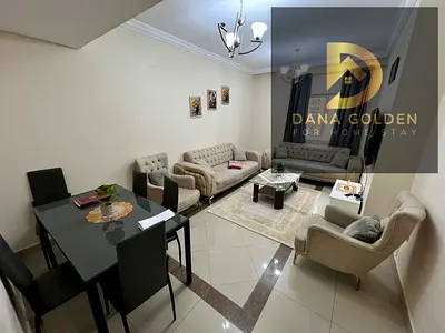 For monthly rent: three bedrooms, two living rooms, balcony, three bathrooms, maid's room, first occupancy, sea view, internet, in Sharjah, Al Taawun